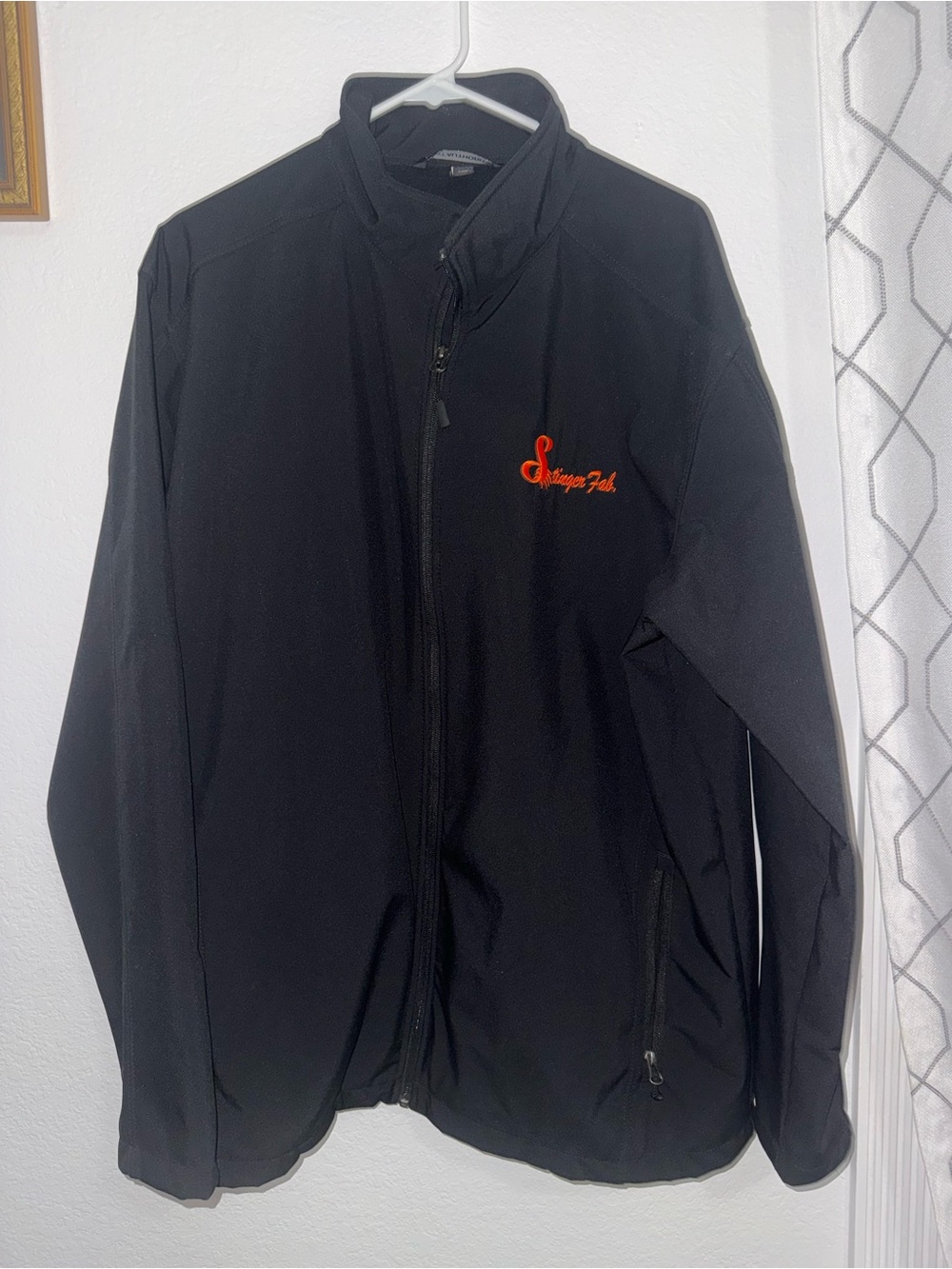 Port Authority Black Jacket with Orange Script Logo
